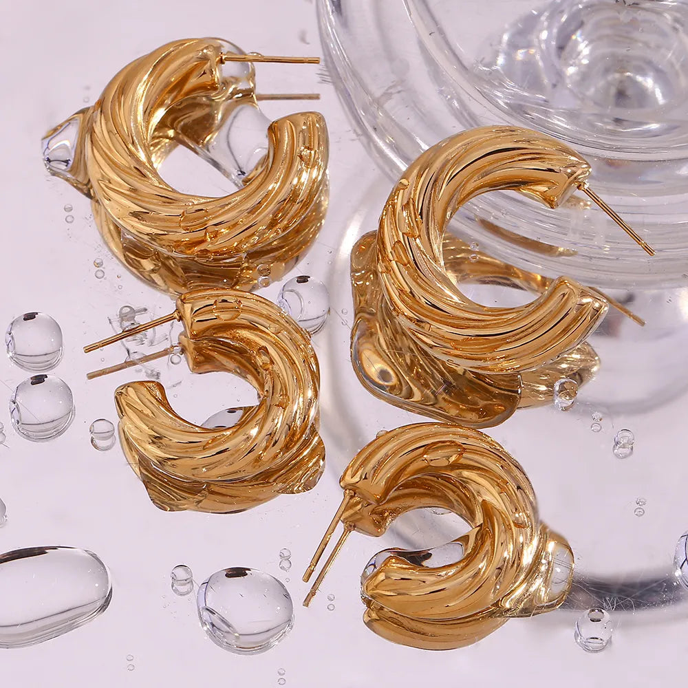 Brinco Argola Torcida Banhado a Ouro 18K